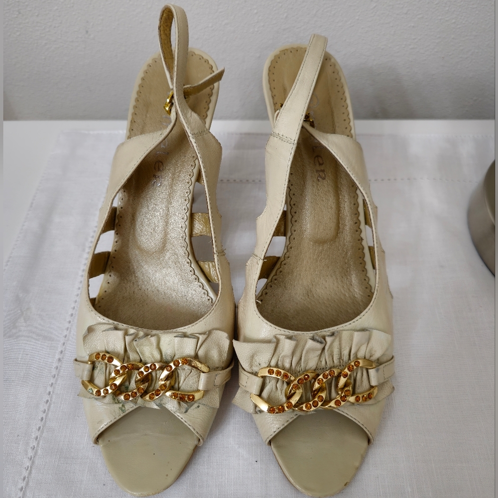 Genuine leather ivory womens heeled sandals.
